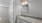 bathroom with granite countertop and entry to bedroom