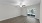 living room with open area and natural light