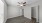 bedroom with wood flooring and natural lighting