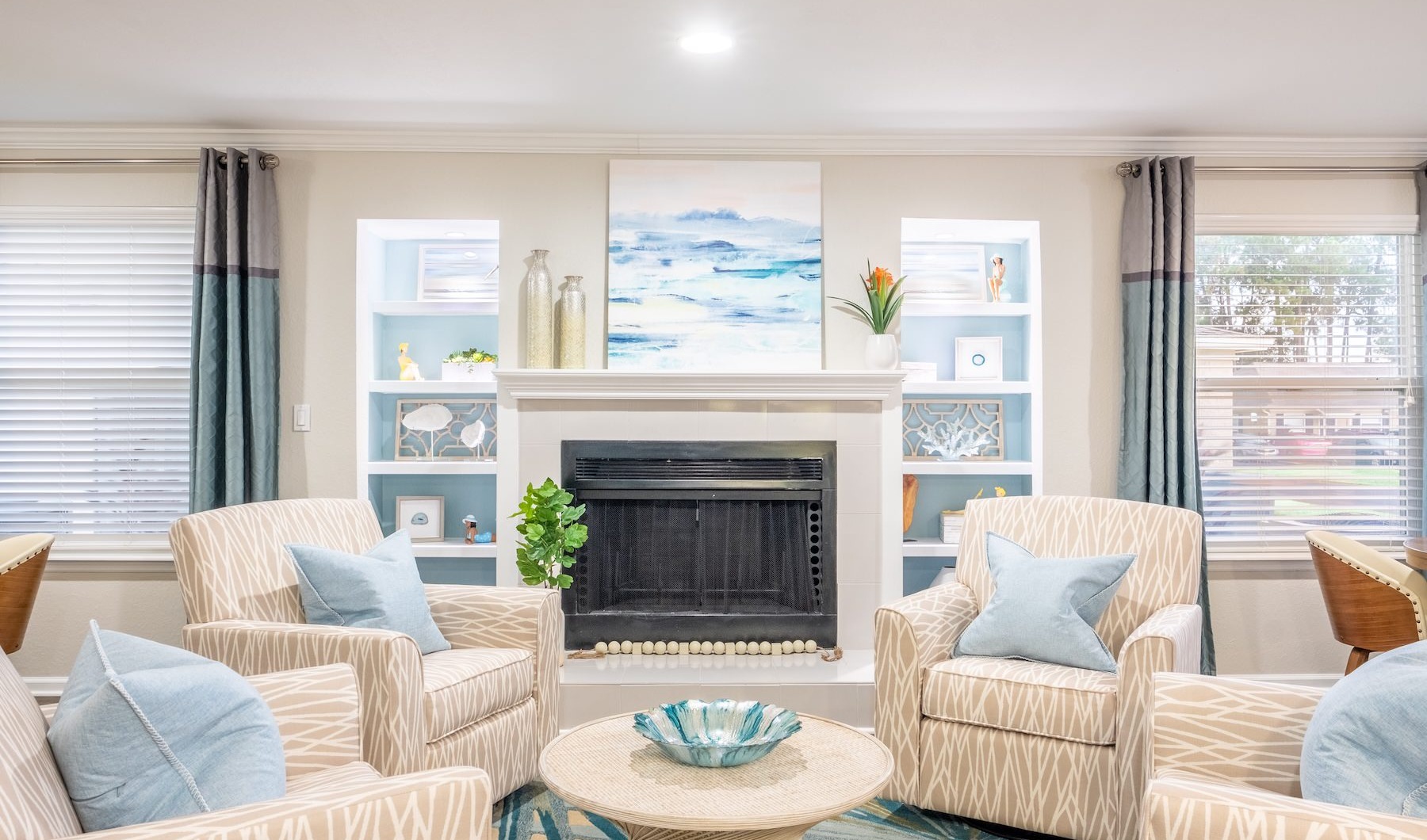 a living room with a fireplace