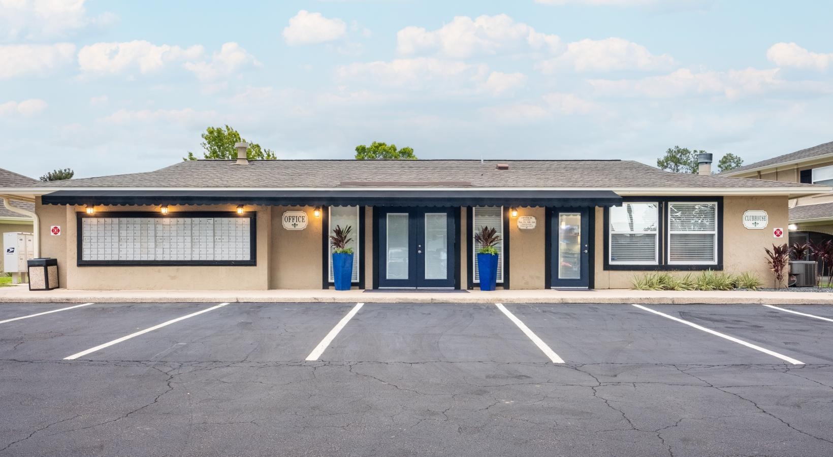 Settle into comfort at Pickwick Flats a building with a parking lot