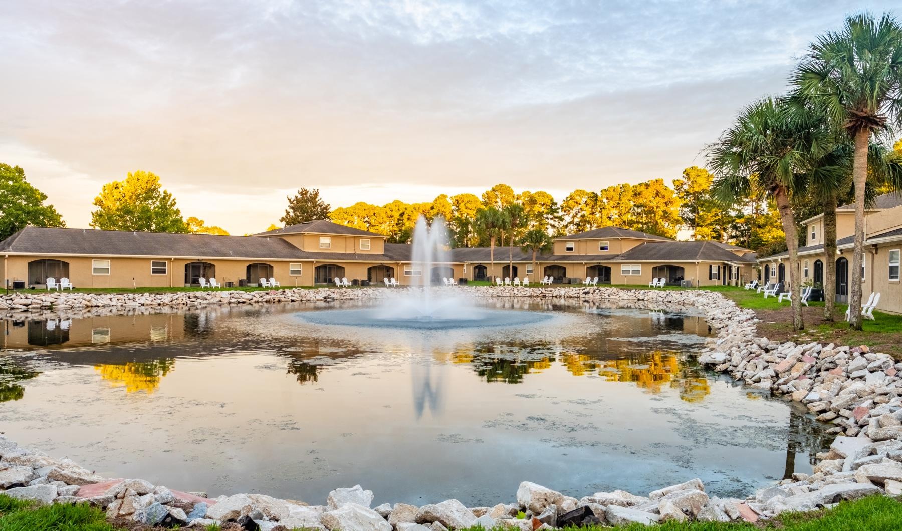 a fountain in a pond