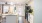a kitchen with white cabinets