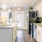 a kitchen with white cabinets