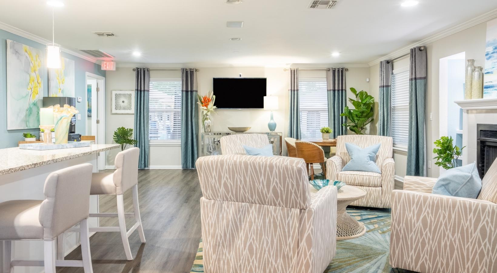 The essence of exceptional living a large living room with a large television and a large table
